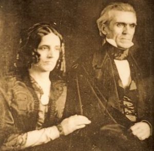 An old brown-toned photo of James Polk and his wife